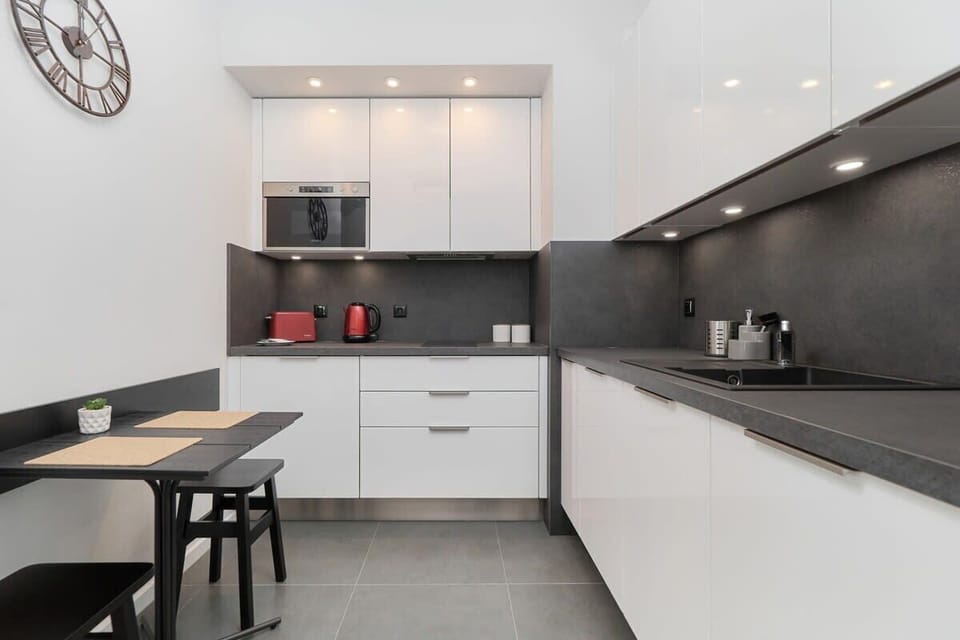 The fully equipped kitchen includes everything you need for a home-cooked meal.