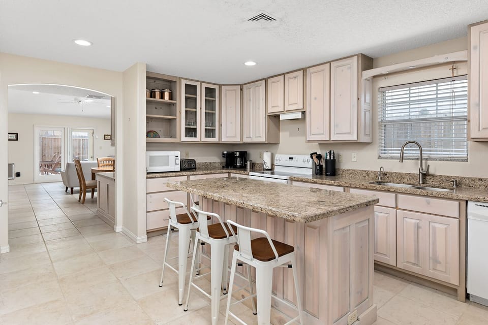 Full Kitchen has a lot of counter space and cabinets and fully stocked! 