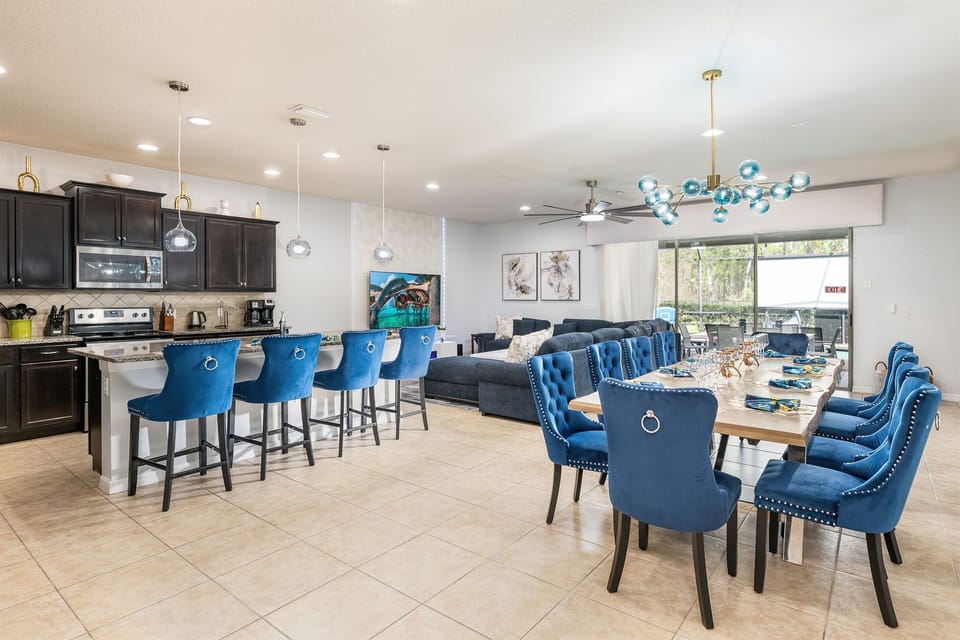 Fully stocked kitchen with indoor seating for 14
