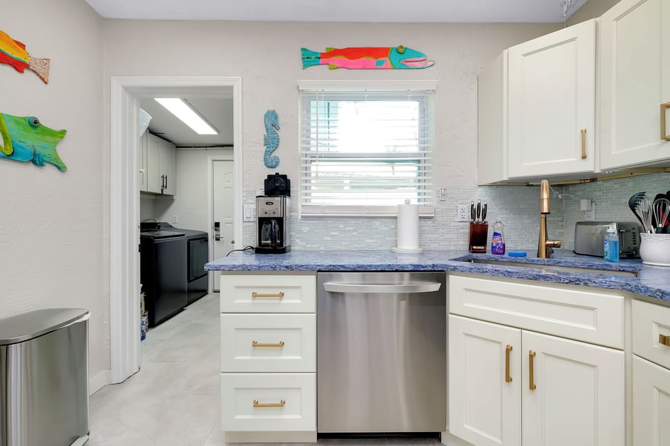 Shared Laundry Room is right off the kitchen