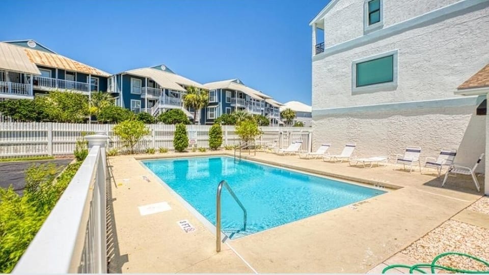 Community pool just steps from the front door!