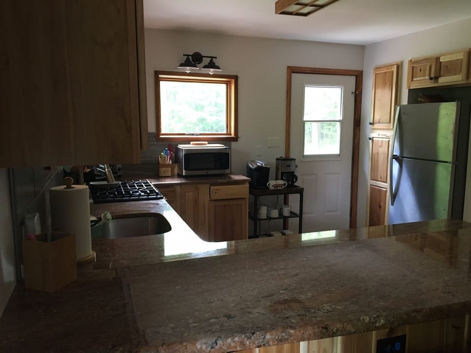 New Kitchen with Granite and Stainless Appliances

