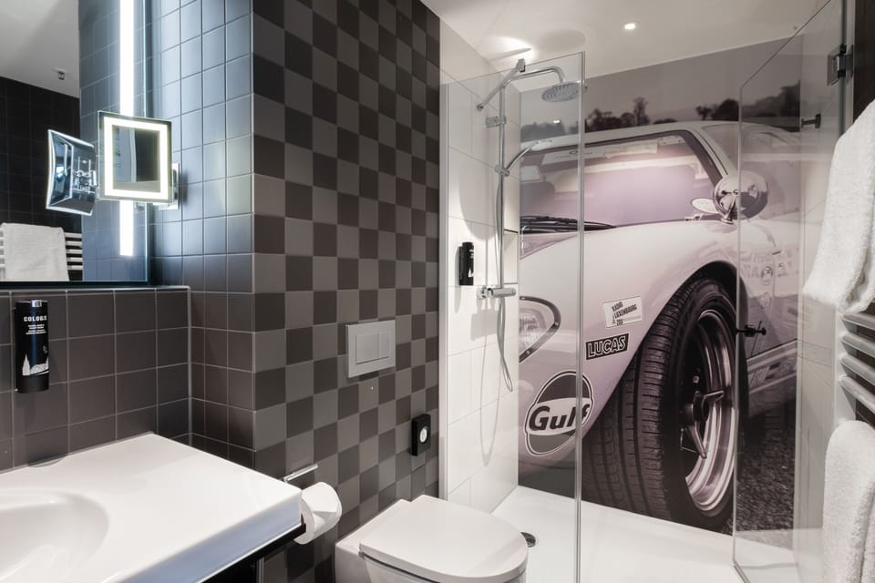 Shower, rainfall showerhead, hair dryer, towels