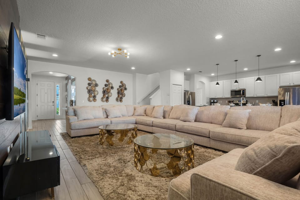 - Resort style lazy river with palm trees and water activities  
- Orlando vacation rental with access to gym and tennis courts  
- Family-friendly stay with clubhouse, bar, and fitness center