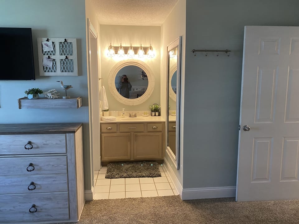 Bedroom 1 with private bath area.