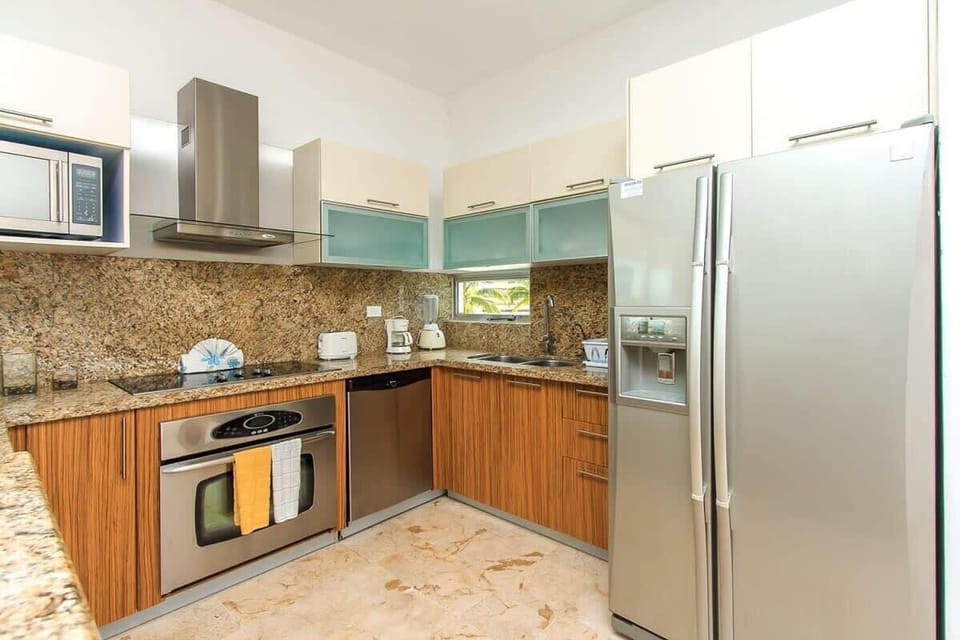 Whip up culinary delights in a bright and inviting kitchen space!
