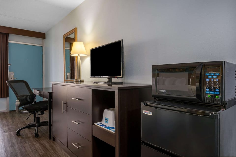 Desk, blackout drapes, soundproofing, iron/ironing board