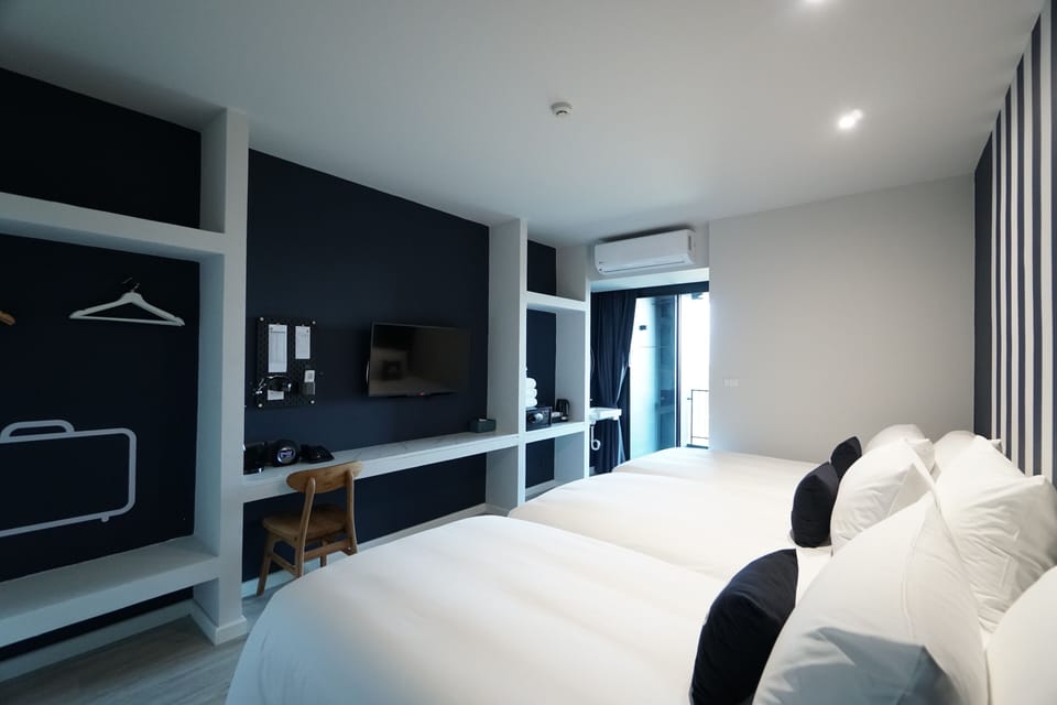 Deluxe Triple Bed | In-room safe, desk, blackout drapes, soundproofing