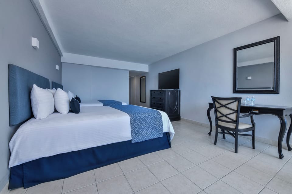 Down comforters, in-room safe, blackout drapes, iron/ironing board