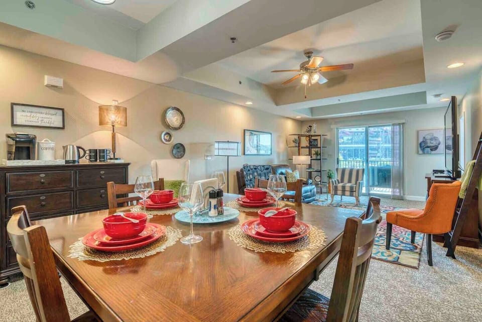 The spacious dining area has enough space to accommodate 6 people, with an additional 3 bar stools available at the counter.