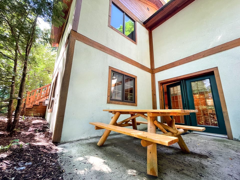 Outdoor seating - The lower level of the condo has a picnic table and a gas grill.  The upper level has a patio set