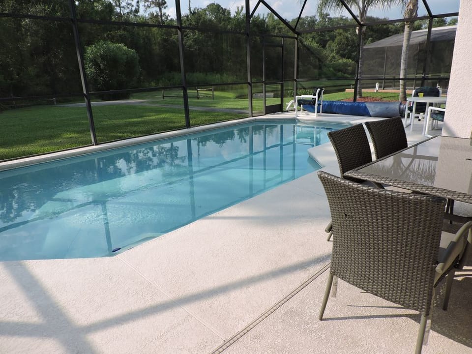 Private pool with conservation view. South west facing, sun all day long
