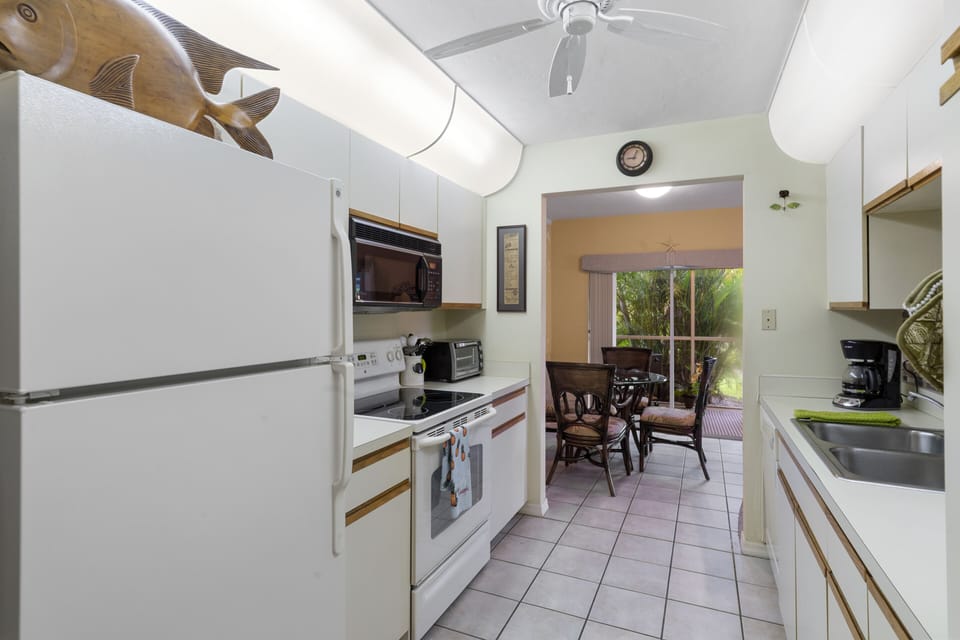 Kitchen has new stainless double door fridge and microwave