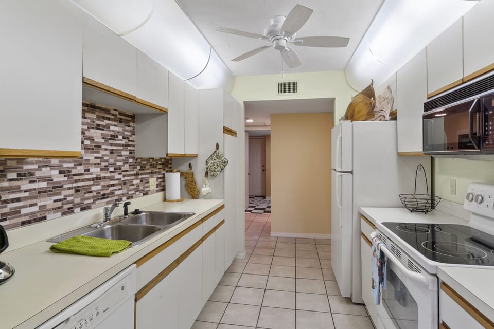 Kitchen has new stainless double door fridge and microwave