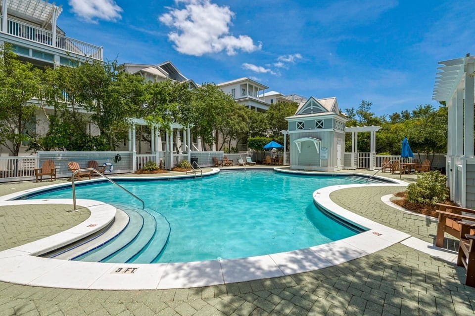 Large community pool only steps from the homes backdoor!