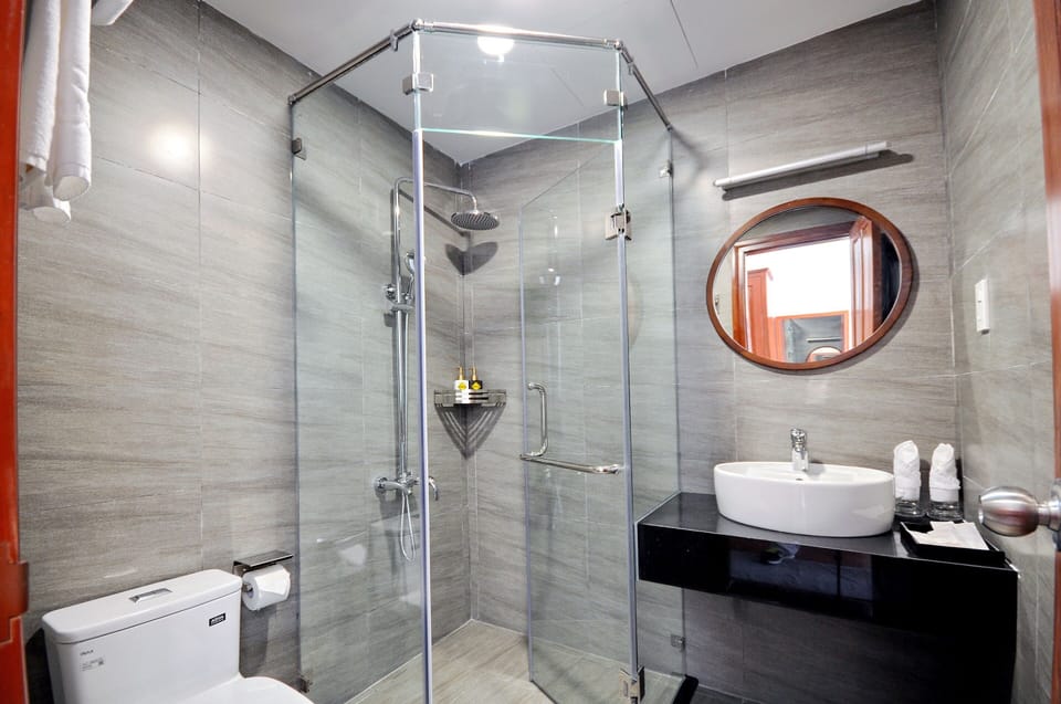 Shower, slippers, bidet, towels