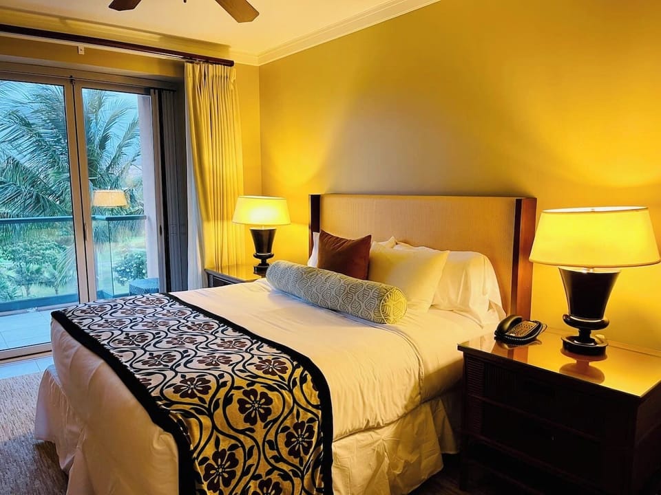 Master bedroom suite with king-size bed