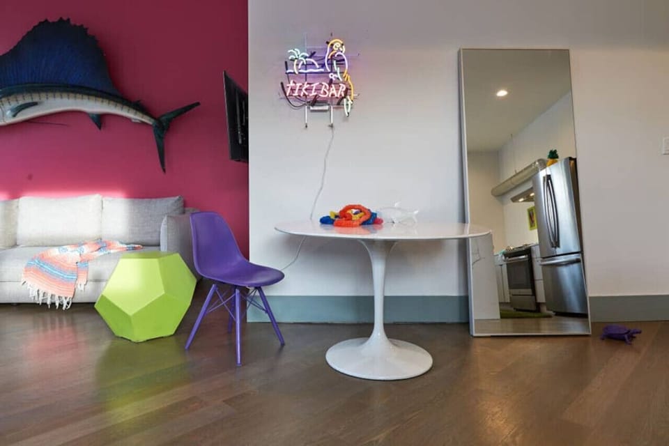 Colorful and stylish living room with unique decor and plenty of personality 🎨📺 Includes a 55` HD TV with Roku to stream your favorite movies and shows—HDMI cable provided!