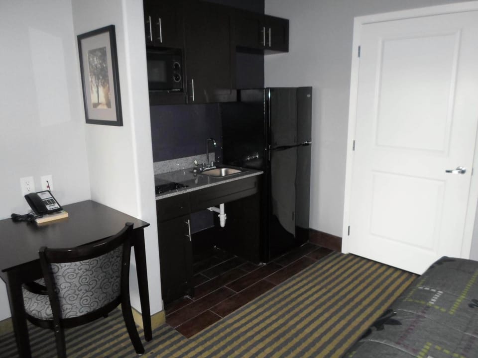 Fridge, microwave, coffee/tea maker, dining tables