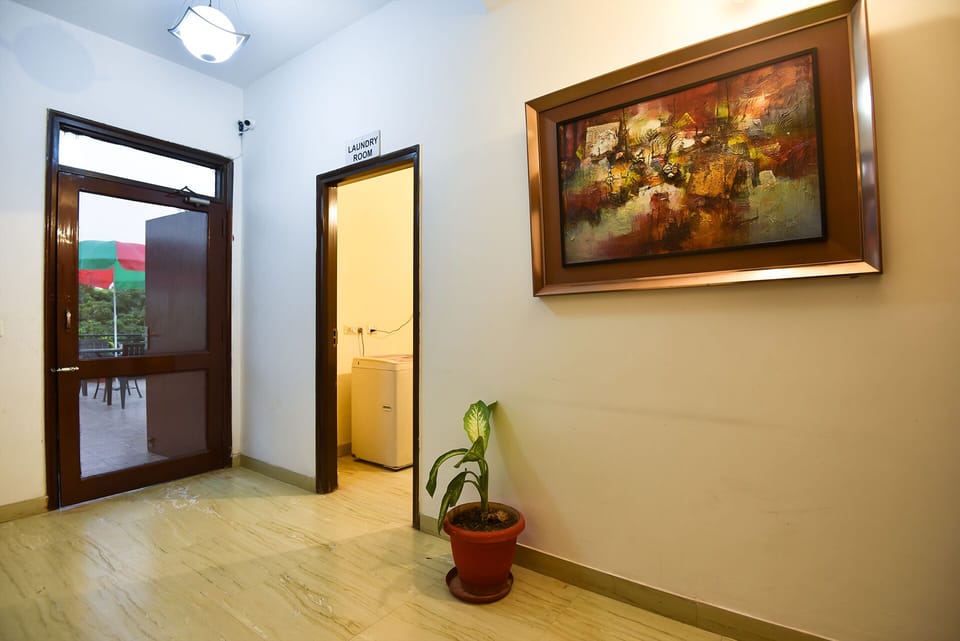 Washing Machine Area of Studio Apartment by BedChambers.