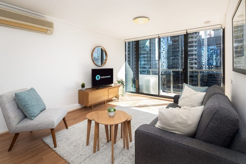 Open plan living which flows onto balcony