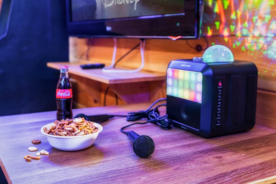 Enjoy snacks, drinks, and karaoke nights with our entertainment setup, a guest favorite for fun cabin evenings.