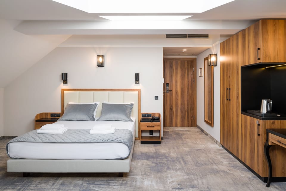 Standard Double Room (Attic) | Living area | 43-inch flat-screen TV with digital channels, TV