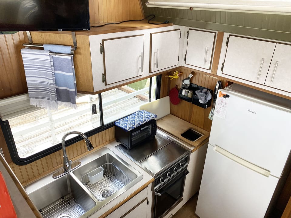 Looking down from the living area into eat-in kitchen.
