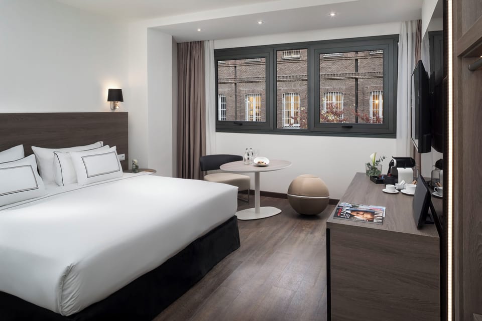 Communicated Room (Melia, The Level) | Egyptian cotton sheets, premium bedding, minibar, in-room safe