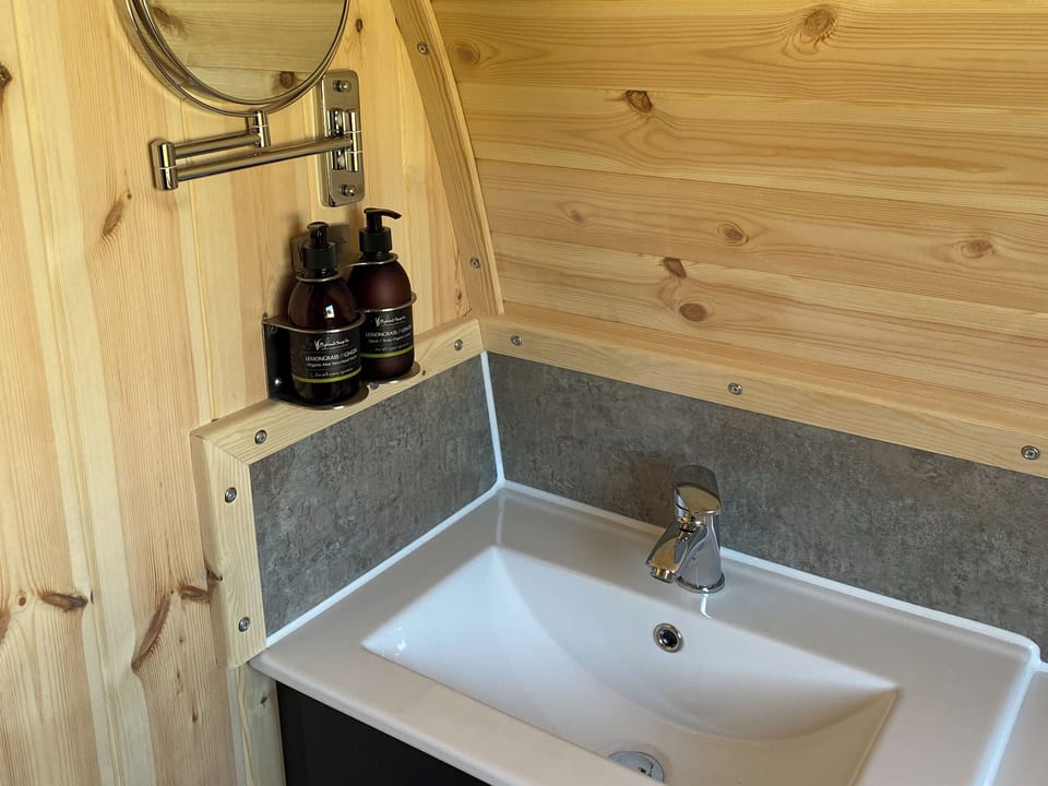 Modest washing facilities in the shower room | Maggie&rsquo;s Cabin, Oban