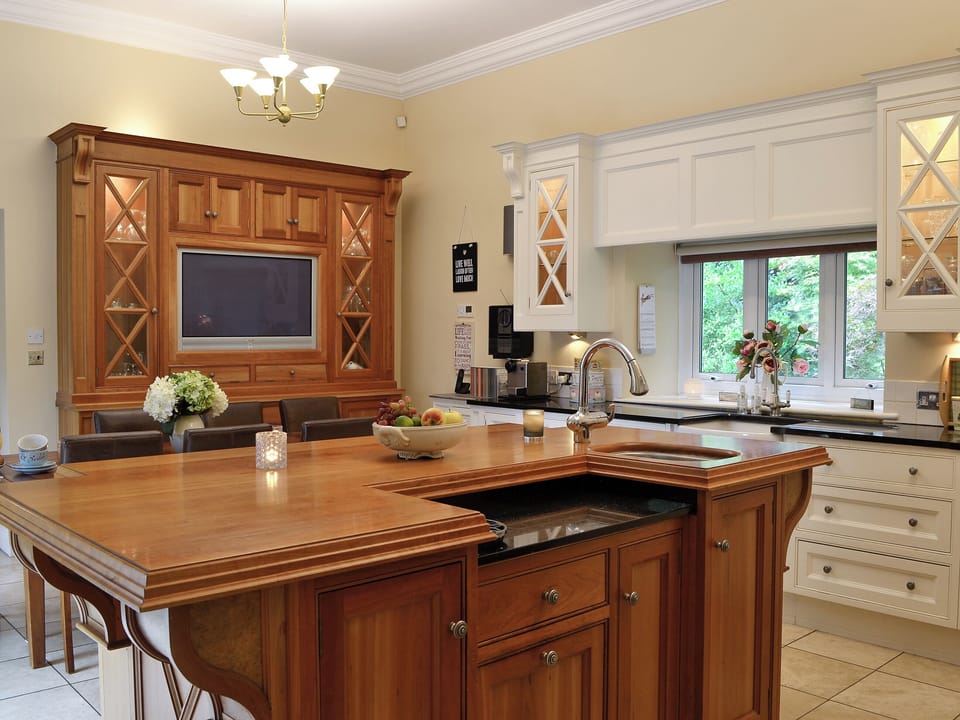 Amazing kitchen/ dining room that is very well equipped and features a large island | The Coach House, Keswick