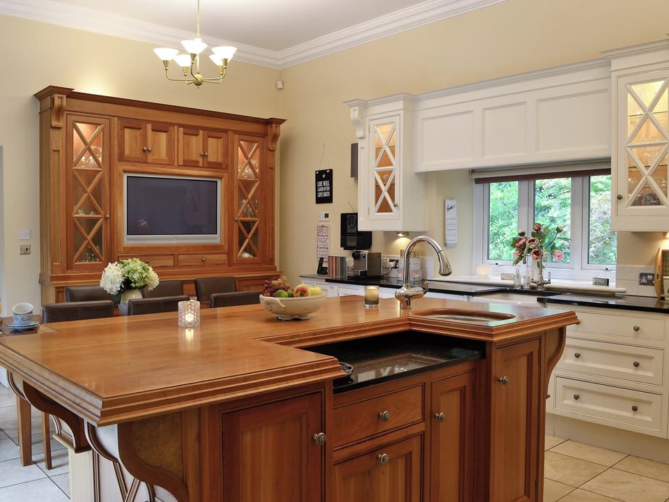 Amazing kitchen/ dining room that is very well equipped and features a large island | The Coach House, Keswick