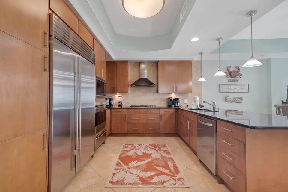 From morning coffee to evening entertaining, this kitchen provides everything you need, including a view that will inspire. Modern appliances, rich cabinetry, and a bright, open feel make it truly exceptional.
