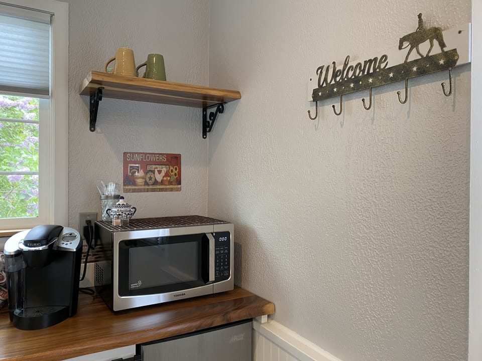 Hang your coat up and have a cup!