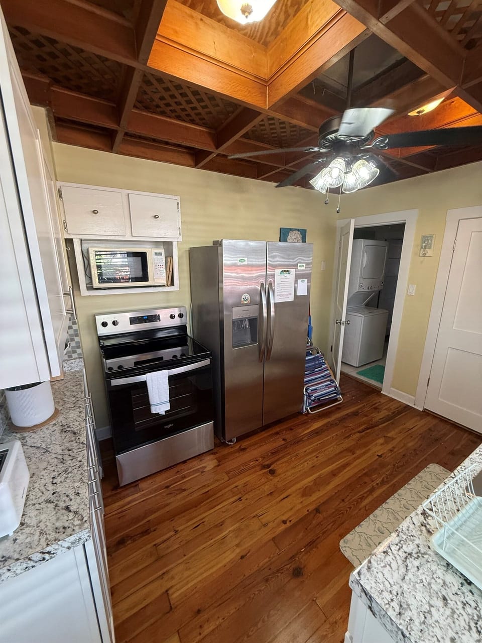Full kitchen with stainless appliances, coffee maker, and everything stocked for cooking!
