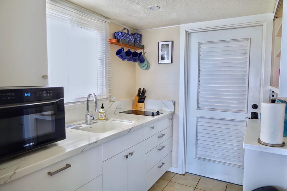 Newly remodeled, galley-style kitchen, Compact but fully equipped.