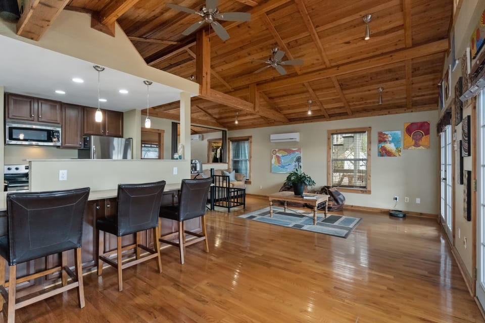 Main level. 2 french doors to deck. Spiral staircase to below. Spectacular views