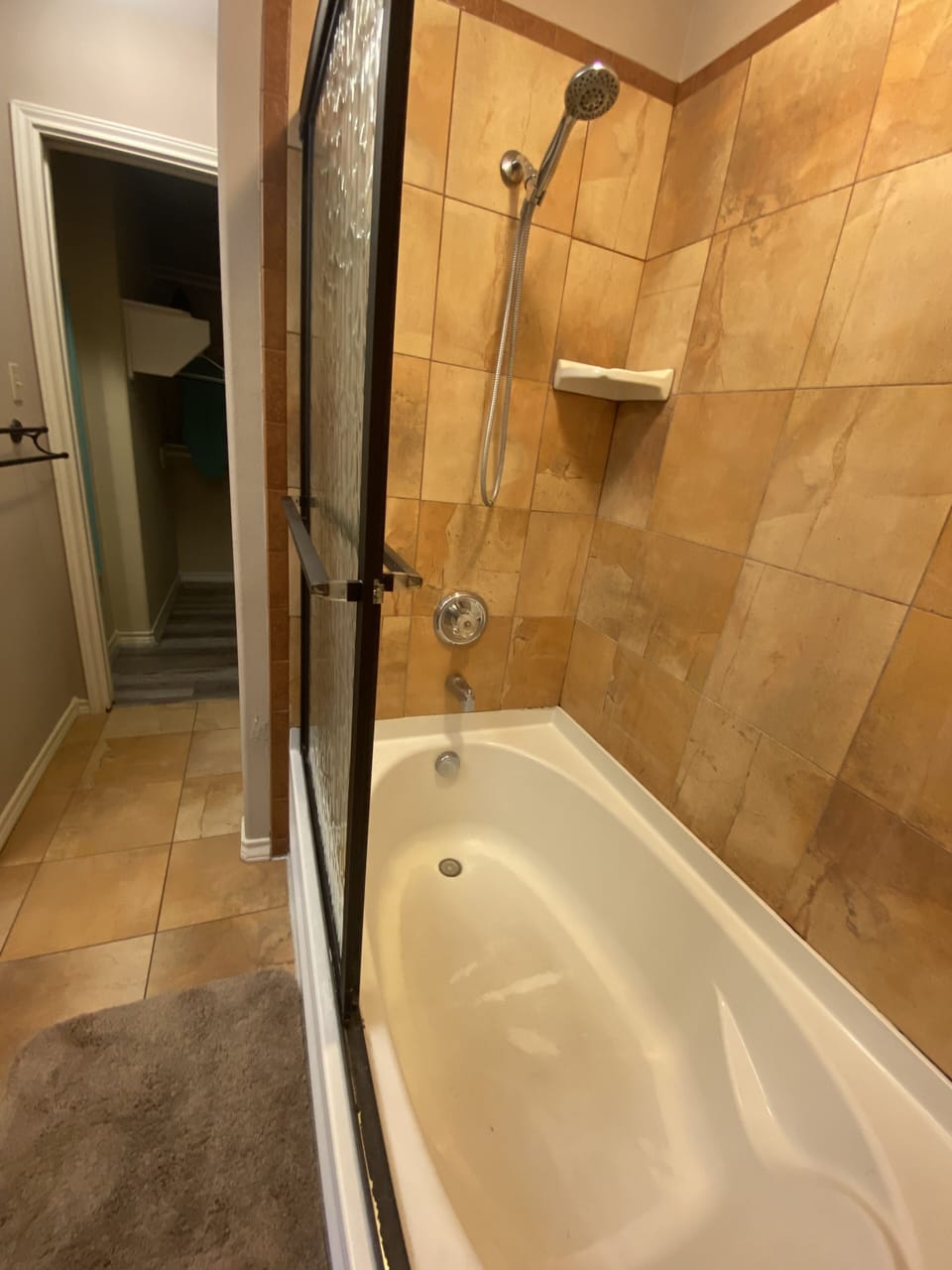Master bathroom with full tub and shower 