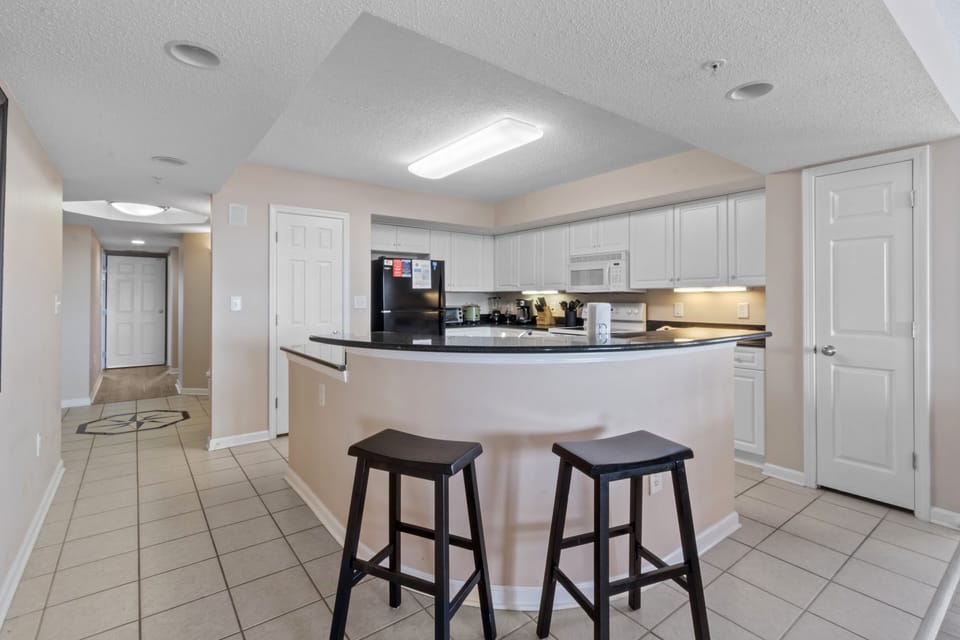 Bar Sitting Area/Kitchen