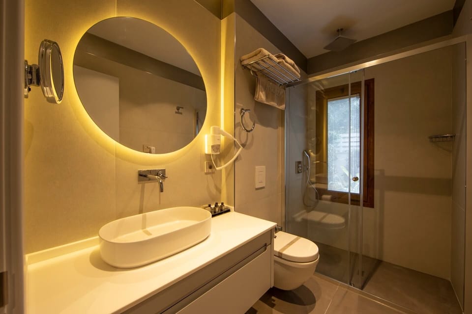 Elite Room | Bathroom | Shower, rainfall showerhead, designer toiletries, hair dryer