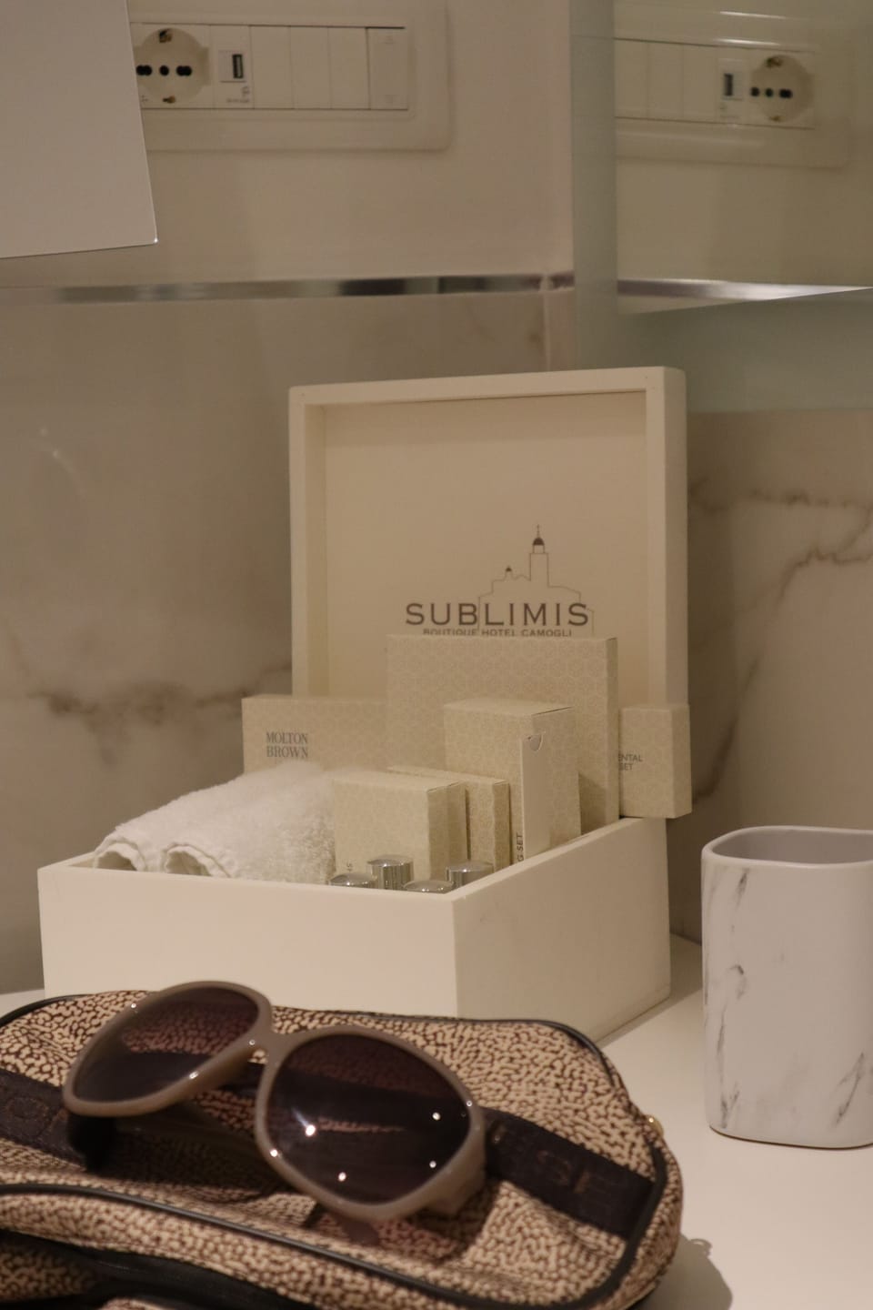 Designer toiletries, hair dryer, bathrobes, slippers