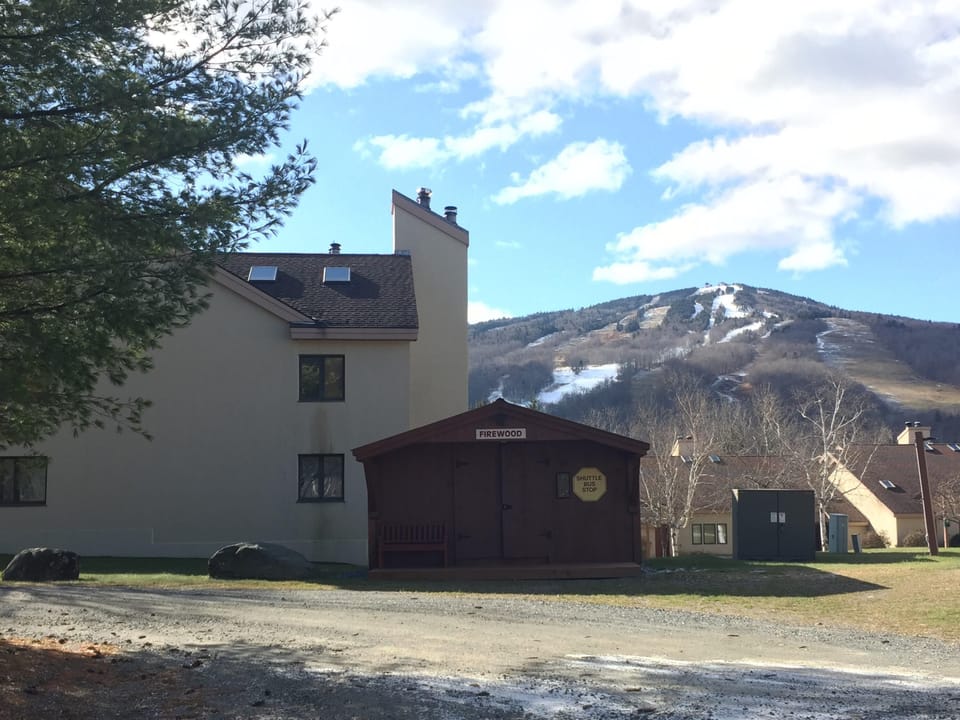 In front of Mount Snow! (fire shed/ Moover Shuttle stop pictured)