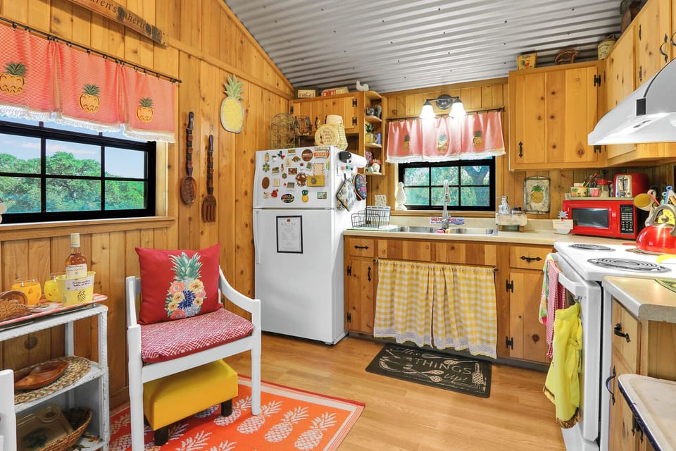 The kitchen is to the right