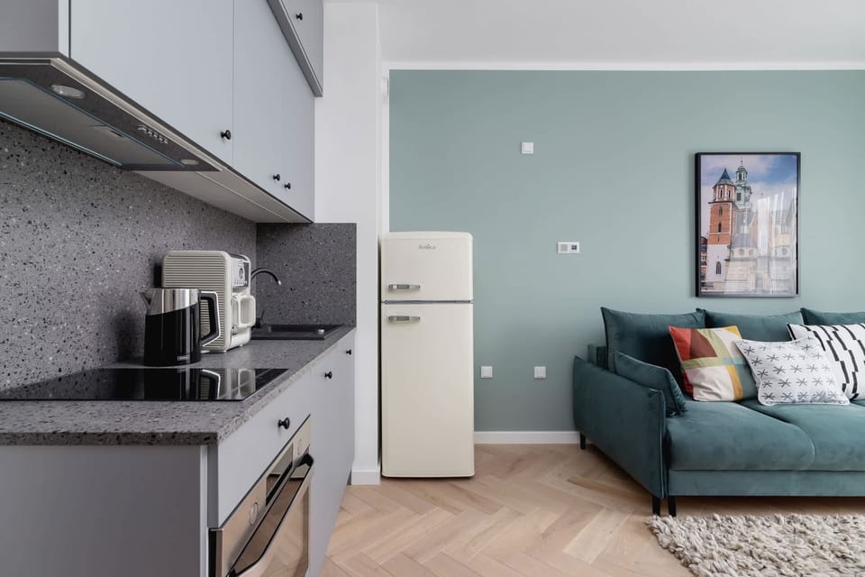 The living room's modern and stylish decor creates a welcoming atmosphere. 