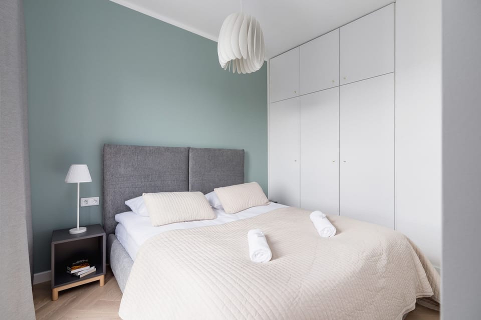The bedroom features a luxurious double bed for a restful night's sleep. 