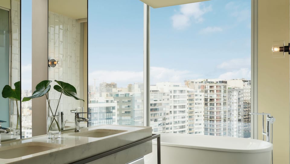 Suite, 1 King Bed with Sofa bed, Sea View (SOUMA) | Bathroom | Shower, rainfall showerhead, eco-friendly toiletries, hair dryer
