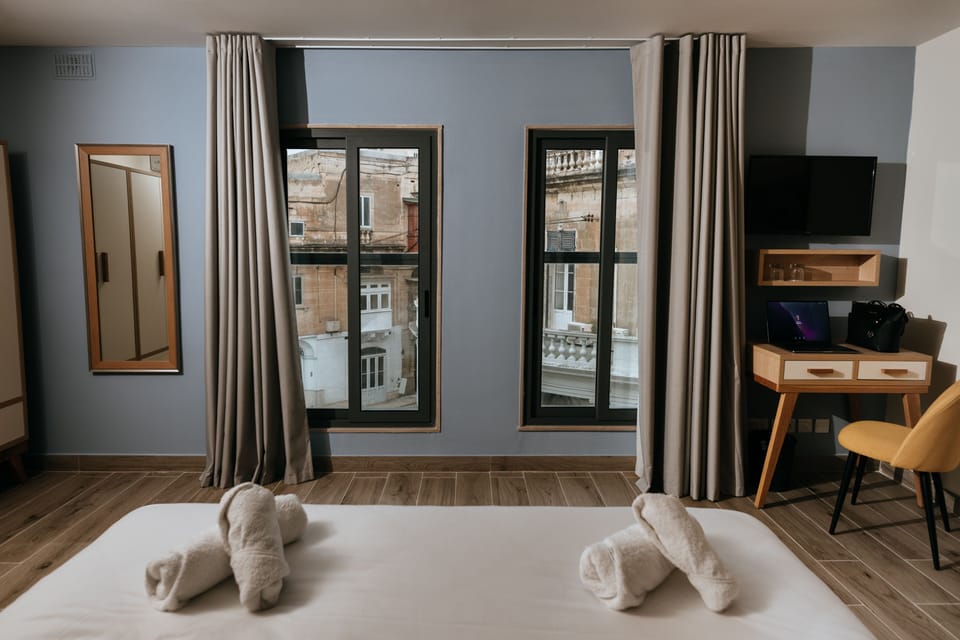 Superior Double Room | Minibar, desk, laptop workspace, blackout drapes