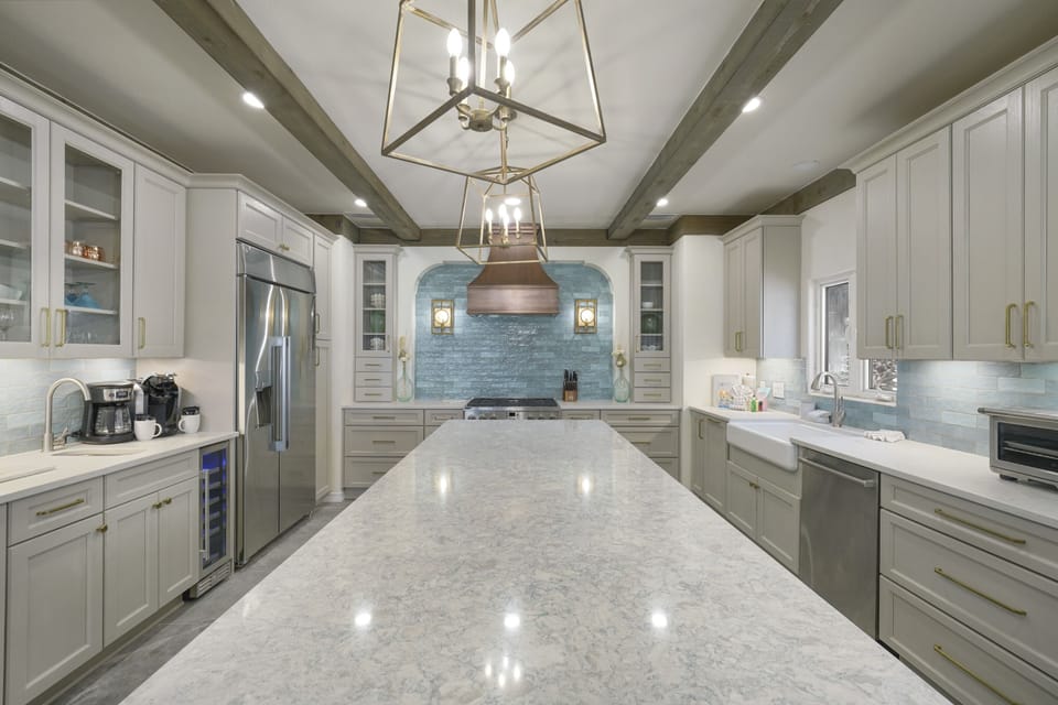 This island is massive with a ton of workspace and outlets underneath. Perfect for blenders and other appliances.