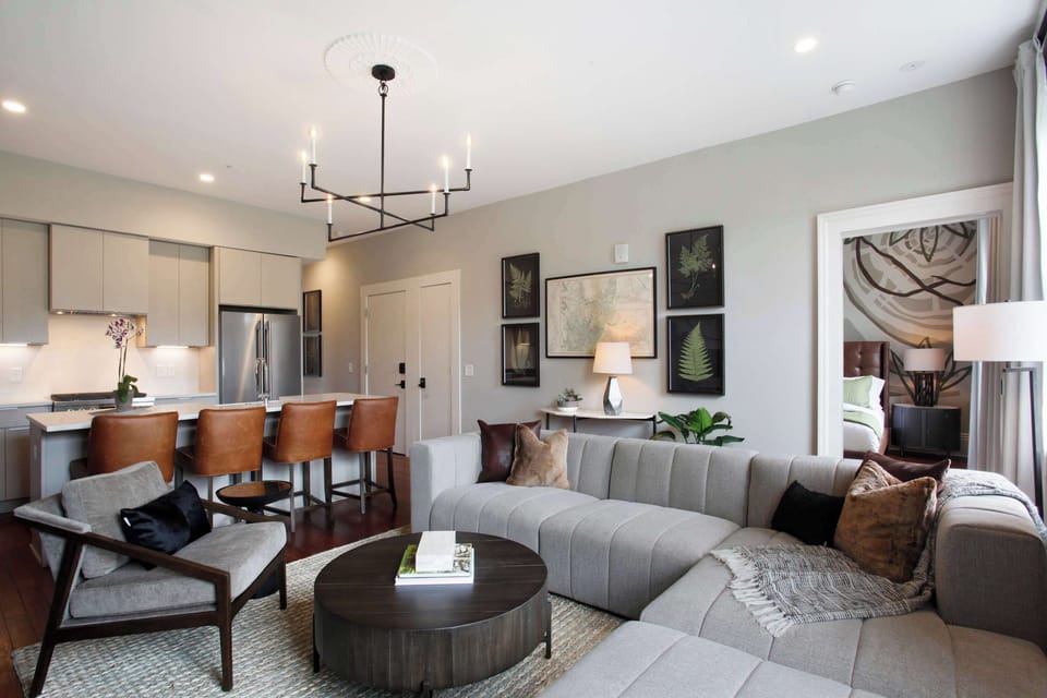 Living Room | Open Layout View with Dining Area | Fourth Floor of Building — Unit on One Level