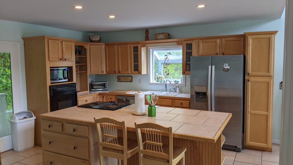 The spacious and fully stocked kitchen allows you to prep those yummy meals!
